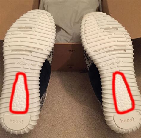 fake black adidas yeezy|bottom of real yeezys.